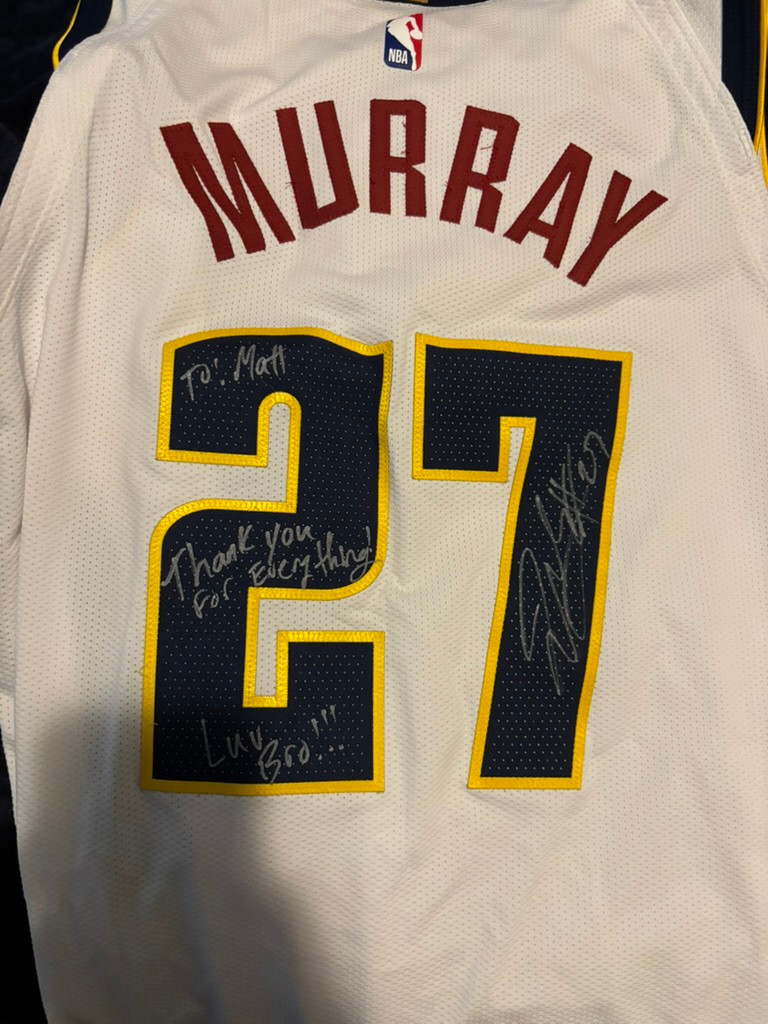 Murray number 27 cream basketball jersey from Matt’s collection, with original inscriptions.
